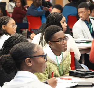 Teen scholars receiving mentorship at Young Executive Leadership Academy